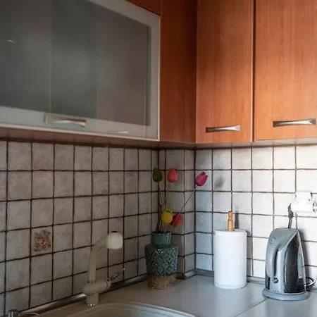 Апартаменти Cozy In Sykies